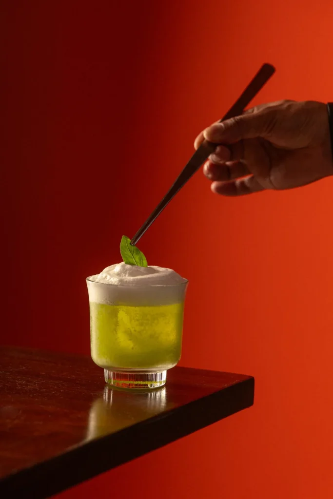 Verde Bianco cocktail with fresh basil and mozzarella foam at Matto in St George’s Bay